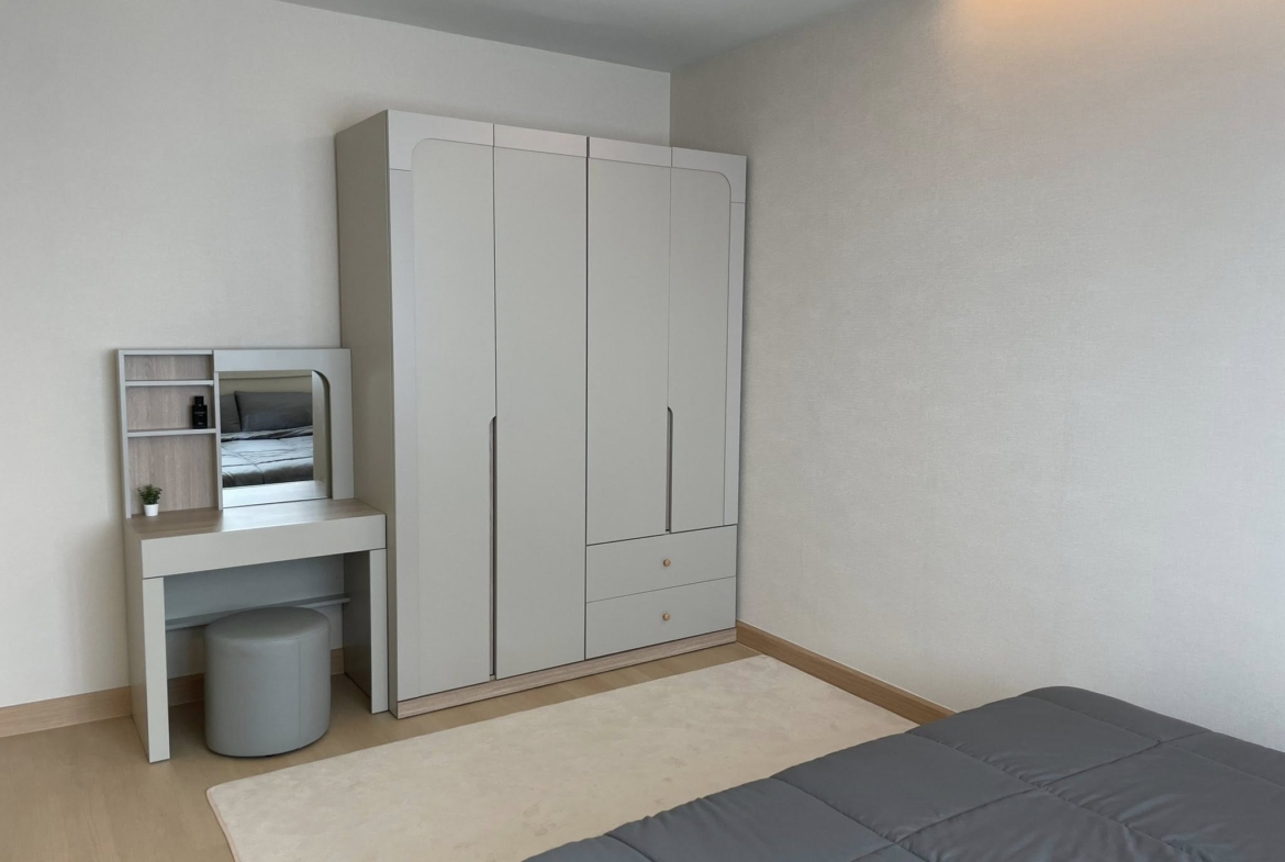 Bedroom TC Green Condominium – Modern Living in Rama 9 CBD, Bangkok